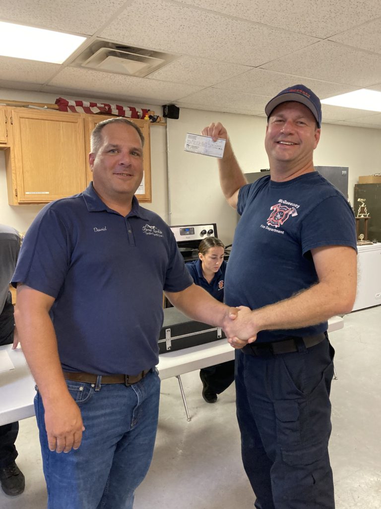 McQueeney VFD Receives Donation from Karras Randolph Signature Property
