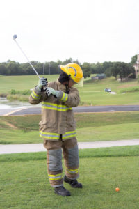 fire fighter golfing